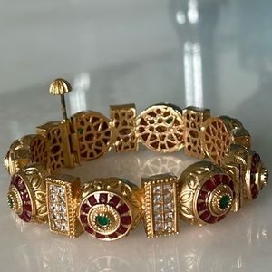 Set of 2 , jeweled bangles.